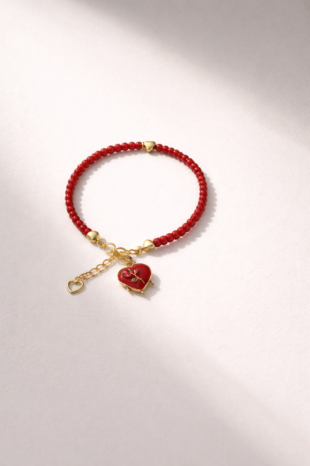 Red Bracelet with Heart Charm - Gold