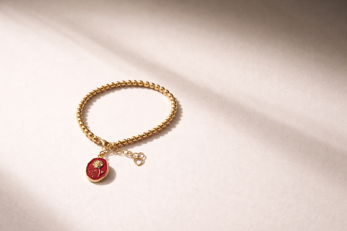 Gold Pearl Bracelet with Charm - Gold