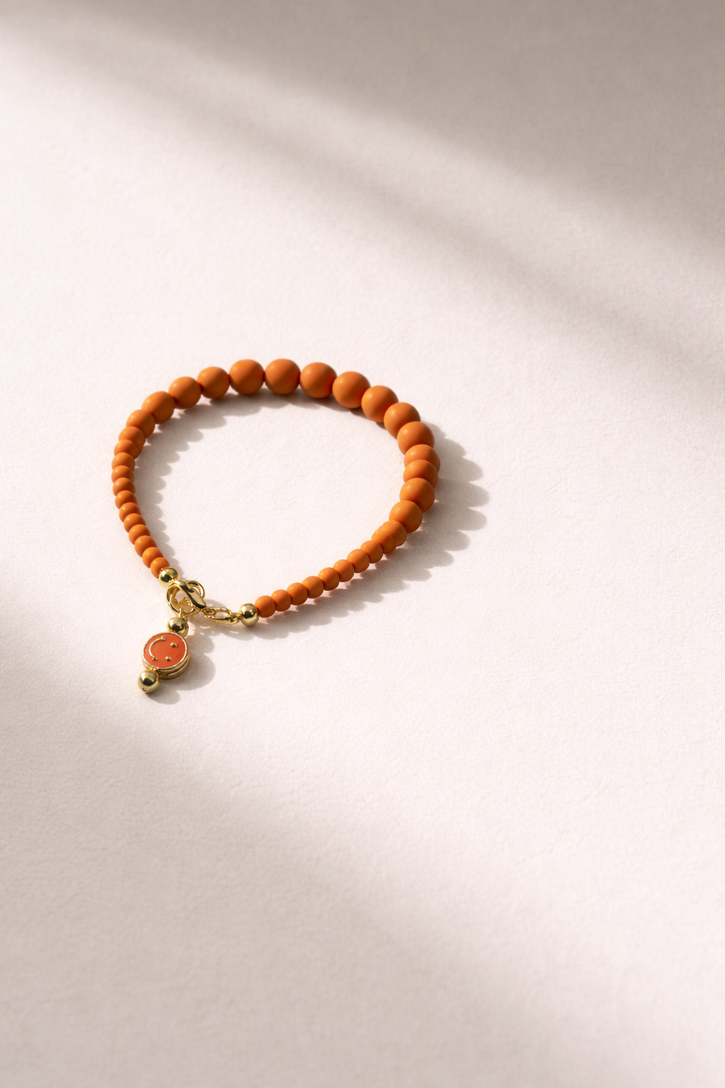 Cosmic Orange Bracelet with Charm - Gold